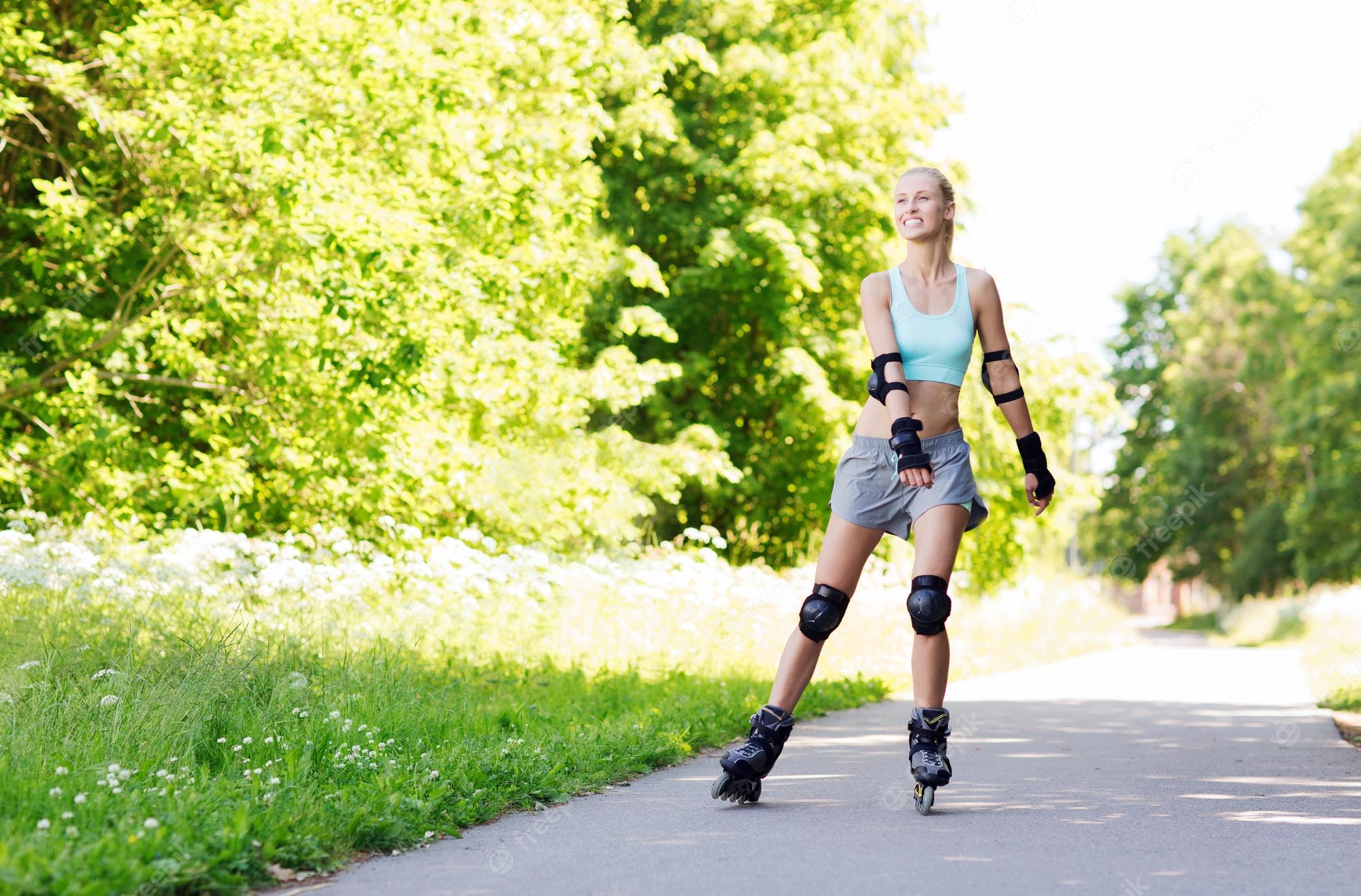 fitness sport summer rollerblading healthy lifestyle concept happy young woman rollerblades protective gear riding outdoors 380164 112871